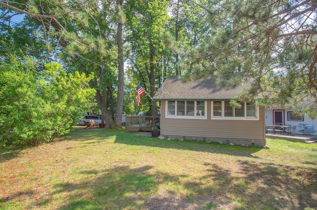 view of yard with a deck