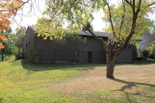 view of yard with central AC unit