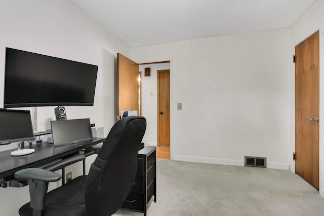 6719 Ewing Ave N, Brooklyn Center, MN 55429 - office area featuring light colored carpet, baseboards, and a textured ceiling