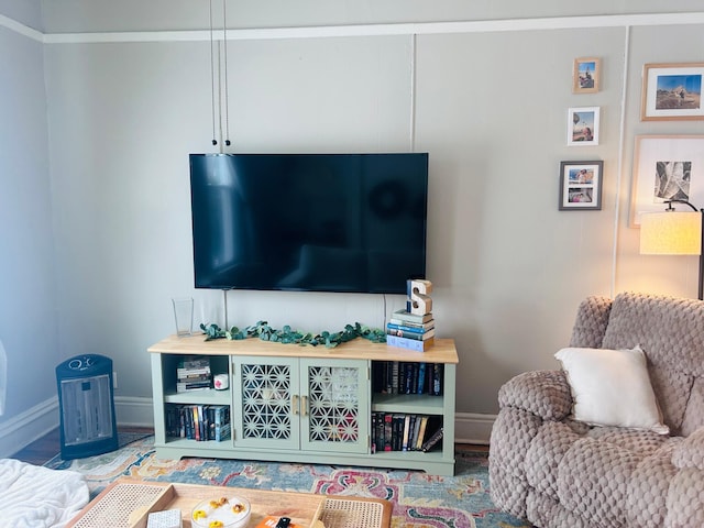 living room featuring baseboards