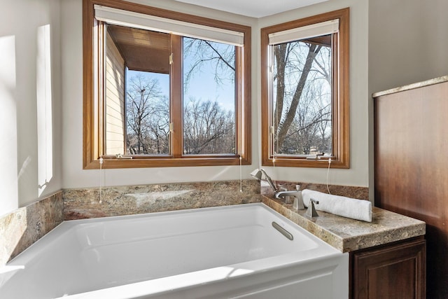 full bathroom featuring a garden tub