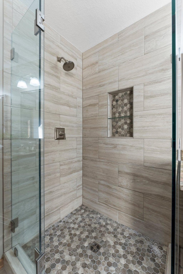 bathroom with a stall shower