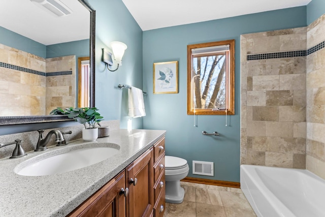 bathroom featuring vanity, toilet, baseboards, and visible vents