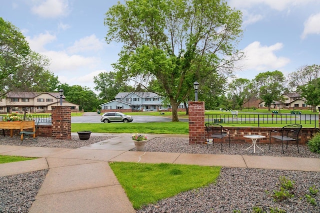 125 96th Ln NE, Blaine, MN 55434 - view of green lawn featuring a residential view