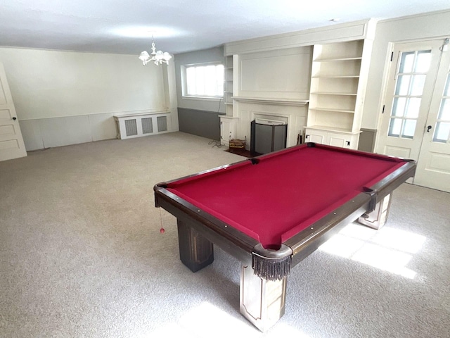 playroom with visible vents, carpet, a fireplace, french doors, and billiards