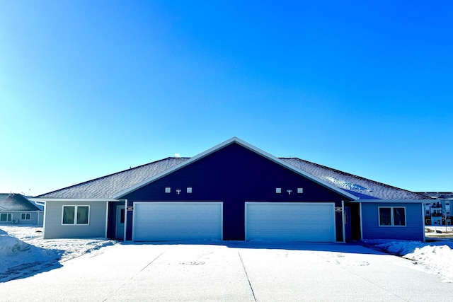 single story home with an attached garage