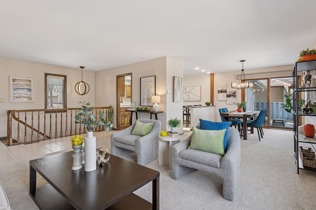 carpeted living area featuring tile patterned floors, a notable chandelier, a healthy amount of sunlight, and recessed lighting