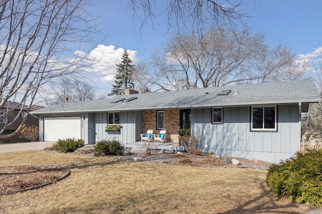 ranch-style house with a front lawn, driveway, board and batten siding, a garage, and a chimney