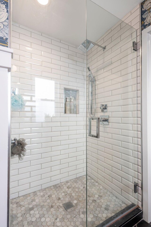 bathroom with a stall shower