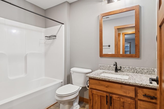 full bath with visible vents, shower / tub combination, vanity, and toilet