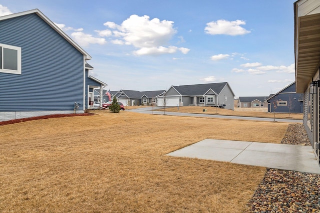 view of yard with a residential view