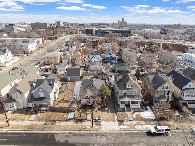 drone / aerial view featuring a residential view and a city view