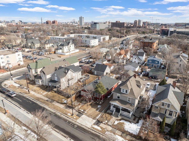 birds eye view of property with a city view and a residential view