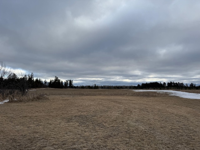 exterior space with a rural view