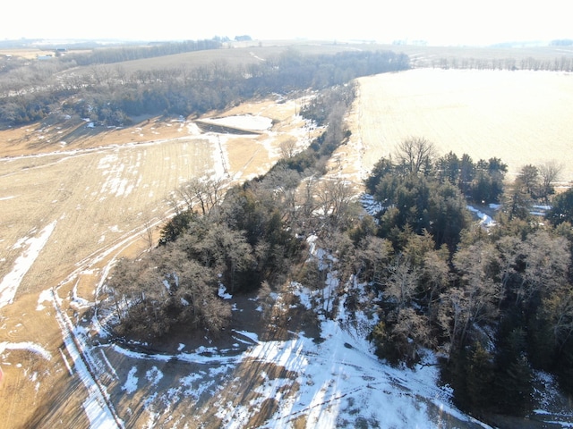 snowy aerial view with a rural view