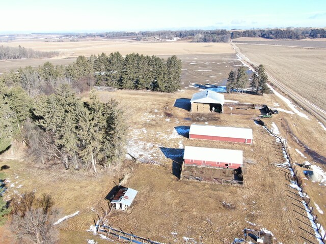 birds eye view of property featuring a rural view