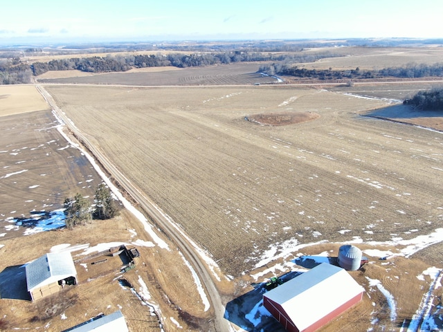 birds eye view of property featuring a rural view