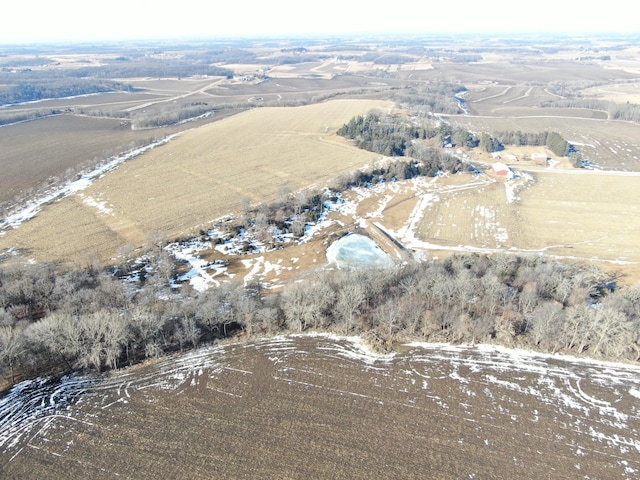 birds eye view of property featuring a rural view