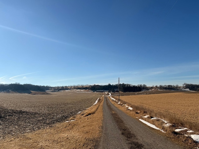 view of street featuring a rural view