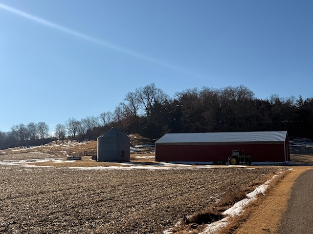 exterior space featuring an outbuilding