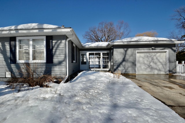 view of front facade featuring driveway and a garage