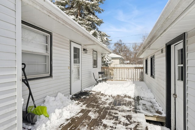 view of snow covered deck