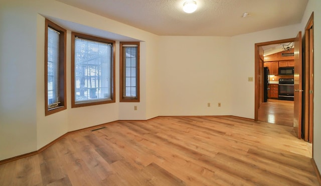 14686 Par Dr, Baxter, MN 56425 - spare room with visible vents, light wood-style flooring, and baseboards