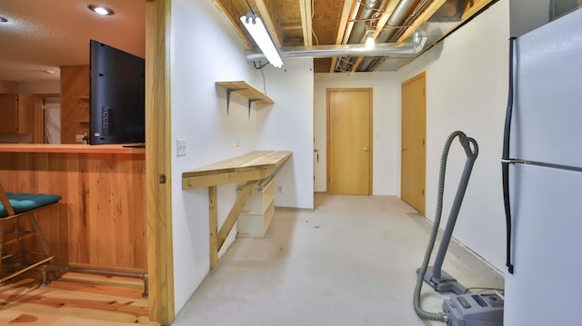 14686 Par Dr, Baxter, MN 56425 - below grade area with a dry bar, recessed lighting, and freestanding refrigerator