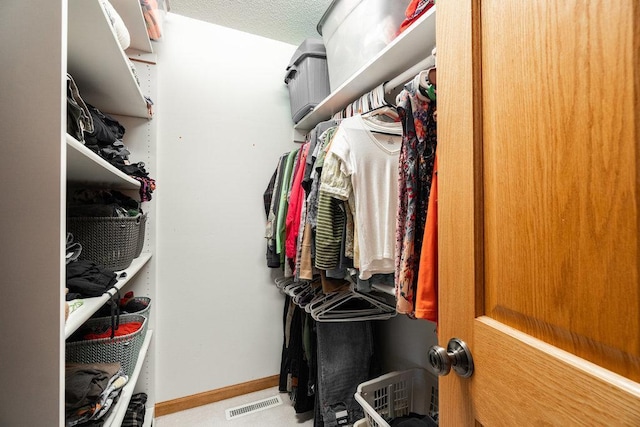 spacious closet with visible vents