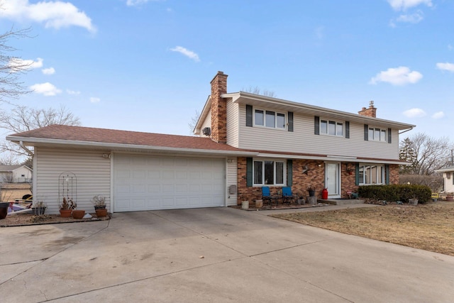 view of front of house featuring concrete driveway, brick siding, a chimney, and an attached garage