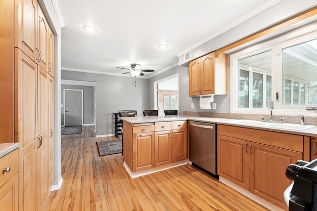 kitchen with range, dishwasher, ornamental molding, a peninsula, and a sink