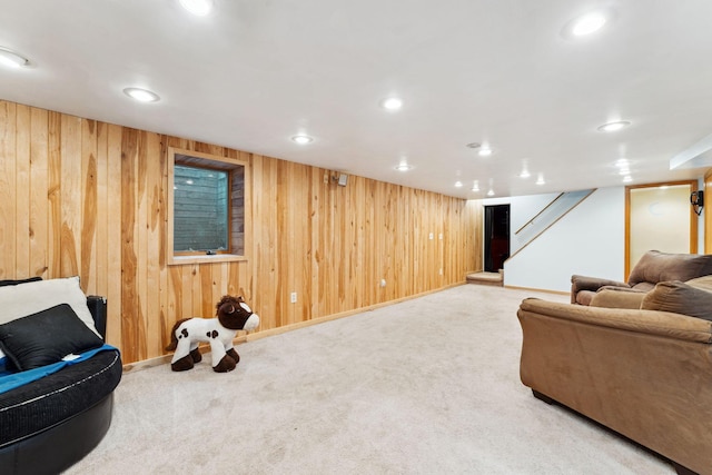 interior space with wood walls, stairway, baseboards, and recessed lighting