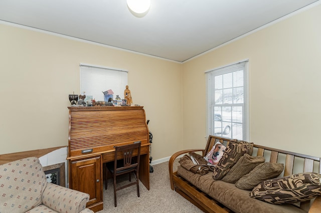 home office with baseboards, ornamental molding, and light colored carpet