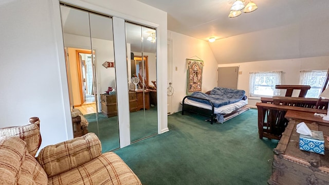 carpeted bedroom with vaulted ceiling