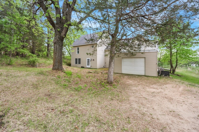 28503 Ottawa Dr, Browerville, MN 56438 - view of yard featuring dirt driveway and a garage