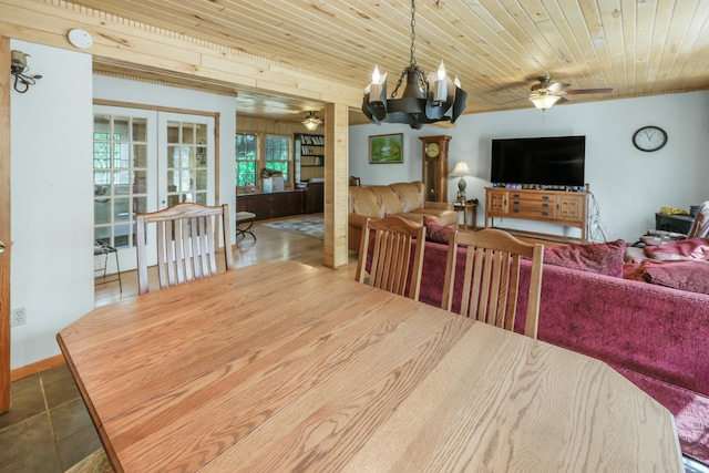 28503 Ottawa Dr, Browerville, MN 56438 - dining room featuring ceiling fan, french doors, a chandelier, wood ceiling, and tile patterned flooring