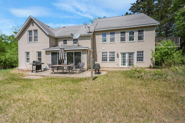 28503 Ottawa Dr, Browerville, MN 56438 - rear view of house with french doors, a yard, and a patio