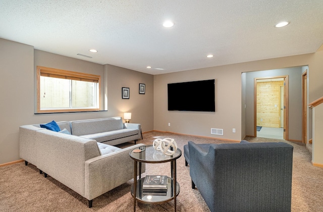 living room with light carpet, visible vents, recessed lighting, and baseboards