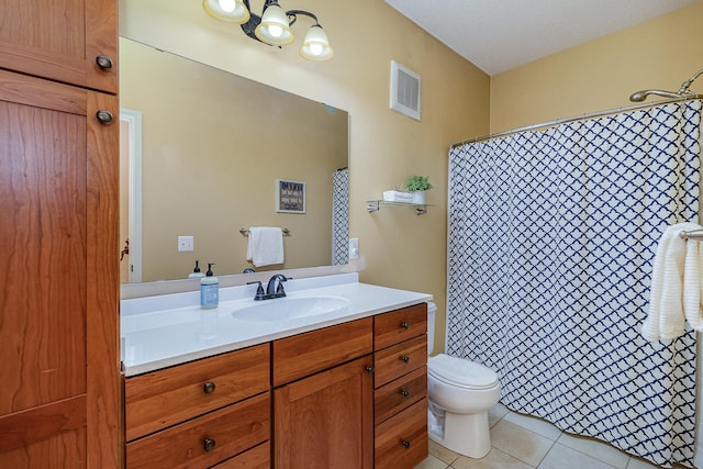 bathroom featuring tile patterned floors, visible vents, toilet, a shower with curtain, and vanity