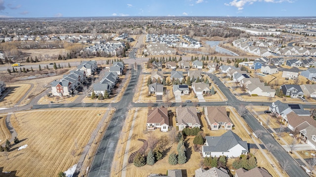 birds eye view of property with a residential view