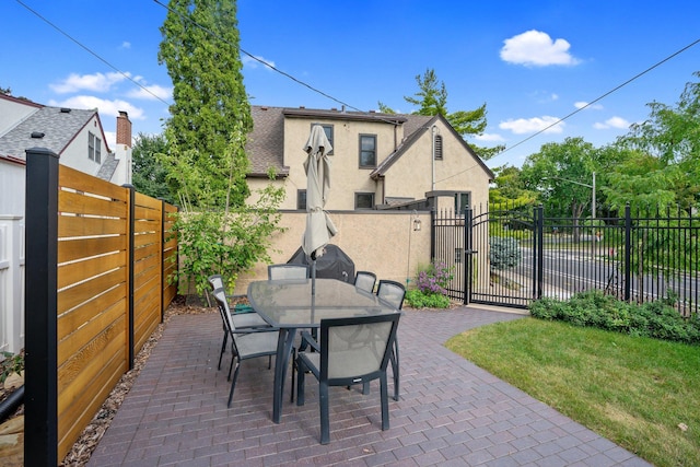 view of patio / terrace with a gate and a fenced backyard