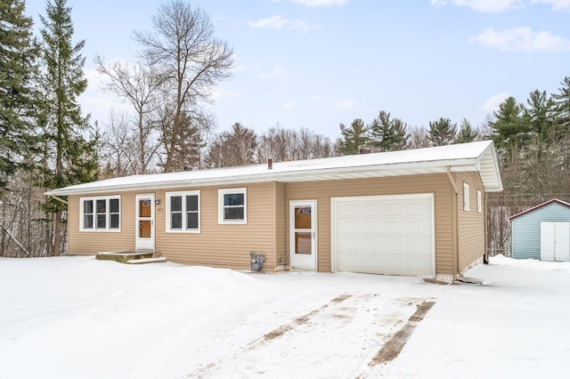 ranch-style home with a garage