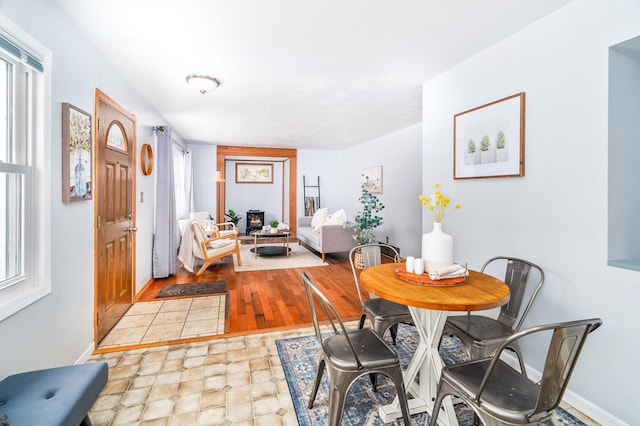 dining space featuring baseboards