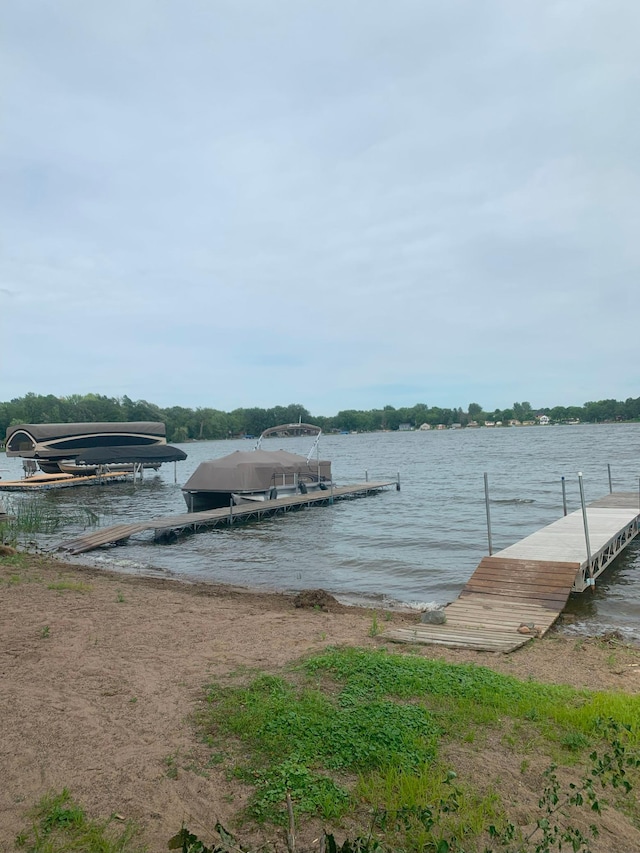 dock area with a water view