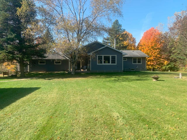 exterior space featuring a front yard