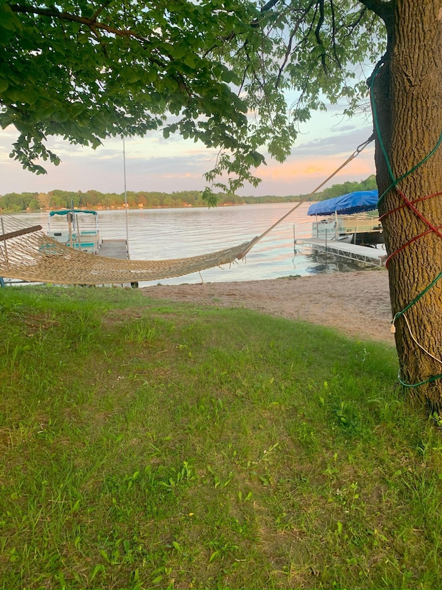 water view featuring a dock