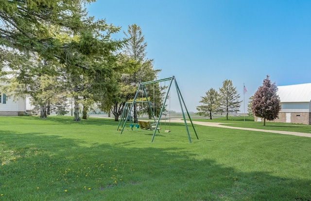 community play area with a lawn