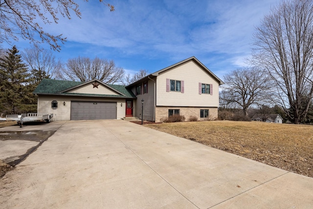 view of property exterior featuring concrete driveway and an attached garage