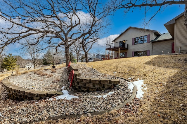 view of yard featuring a wooden deck