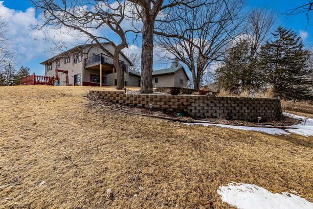 view of yard with a wooden deck